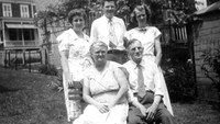 Jean, Ed and Lois and sitting is their Mom and Dad